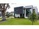Contemporary home with manicured lawn and modern architectural details at 2522 Lafayette Ave, Winter Park, FL 32789