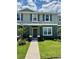 Charming two-story home with a well-manicured lawn and inviting entrance at 6118 Galloping Dr, Apopka, FL 32712
