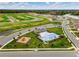 Aerial view of community with pool, playground, and homes at 3503 Fort Mellon Ln, Sanford, FL 32773