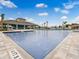 Community pool with lounge chairs and covered pavilion at 3503 Fort Mellon Ln, Sanford, FL 32773