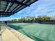 Enjoy a sunny tennis match on this community court, complete with solar panel covered seating at 4113 Fairview Vista Pt # 212, Orlando, FL 32804