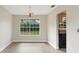 Bright dining room with a large window providing lots of natural light at 304 Hibiscus St, Chuluota, FL 32766