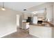 Charming kitchen with wood countertops and stainless steel refrigerator at 304 Hibiscus St, Chuluota, FL 32766