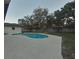 Relaxing kidney-shaped pool with ample deck space at 1501 Noble St, Longwood, FL 32750