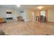 Spacious living room with wood-look tile flooring at 1501 Noble St, Longwood, FL 32750