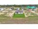 Aerial view of a single-Gathering home with green grass in the back yard at 2676 Hancock Crossing Dr, Bartow, FL 33830