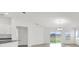 Bright living room with tile floors and sliding doors leading to the backyard at 2676 Hancock Crossing Dr, Bartow, FL 33830