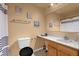 Clean bathroom with wood vanity and striped shower curtain at 3109 Sky St, Deltona, FL 32738