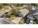 Aerial view of a single-story home with a well-manicured lawn and two-car garage at 7305 Grotto Ave, Orlando, FL 32812