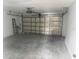 Spacious garage with an automatic door and plenty of room for storage and parking at 7305 Grotto Ave, Orlando, FL 32812