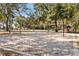 Outdoor sand volleyball court with net, perfect for recreational games at 7305 Grotto Ave, Orlando, FL 32812