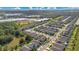 Wide aerial view of a residential community near water at 1162 Alder Tree Dr, Apopka, FL 32703