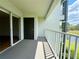 Balcony with sliding glass doors, a closet and a view of the lake at 13803 Fairway Island Dr # 1627, Orlando, FL 32837