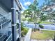 Condo parking lot with a view of a pond at 13803 Fairway Island Dr # 1627, Orlando, FL 32837