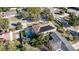 Aerial view of house with solar panels, pool, and surrounding neighborhood at 290 Thomas Dr, Casselberry, FL 32707