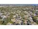 Wide aerial showcasing home and surrounding neighborhood near a body of water at 290 Thomas Dr, Casselberry, FL 32707