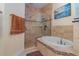 Spa-like bathroom with soaking tub and walk-in shower at 290 Thomas Dr, Casselberry, FL 32707