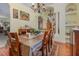 Bright dining room with large table and decorative accents at 290 Thomas Dr, Casselberry, FL 32707