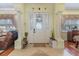 Bright entryway with columns, tiled floor, and decorative accents at 290 Thomas Dr, Casselberry, FL 32707