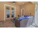 Covered patio with wicker furniture and a view of the pool at 290 Thomas Dr, Casselberry, FL 32707