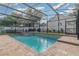 Refreshing swimming pool with spacious screened enclosure at 290 Thomas Dr, Casselberry, FL 32707