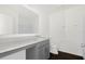 A minimalist bathroom design featuring a single sink and vanity at 3427 Narrows Dr, Lakeland, FL 33810