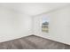 Cozy bedroom featuring neutral carpet, a bright window, and ample natural light at 3427 Narrows Dr, Lakeland, FL 33810