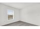 Bedroom featuring plush carpet and a window with natural light at 5736 Thalia Rd, Lakeland, FL 33810