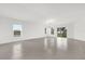 Bright living room with tile flooring and sliding glass doors at 5736 Thalia Rd, Lakeland, FL 33810