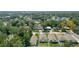 Aerial view of new homes in a residential area with surrounding greenery at 845 Land Ave, Longwood, FL 32750