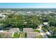 Aerial view of a community with houses and a large green space at 845 Land Ave, Longwood, FL 32750