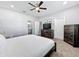 Primary bedroom with king-size bed and ensuite bathroom at 845 Land Ave, Longwood, FL 32750