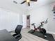 Home office with Peloton bike and built-in closet at 845 Land Ave, Longwood, FL 32750