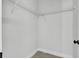 Walk-in closet with rack for optimal storage at 30 Fisher Trail, Ocklawaha, FL 32179