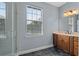 Bright bathroom featuring vanity with storage, glass shower, and tiled floor at 41 E Spruce St, Orlando, FL 32804