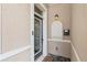 Inviting front entry featuring decorative glass door, stucco walls, and classic black hardware at 41 E Spruce St, Orlando, FL 32804