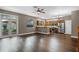 Kitchen and dining room featuring stainless steel appliances, custom cabinets, and hardwood floors at 41 E Spruce St, Orlando, FL 32804