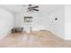 Bright living room featuring tile flooring, ceiling fan, and natural light from the window at 3703 Pembrook Dr, Orlando, FL 32810