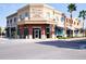 Exterior view of a commercial building featuring brick accents and ample storefront windows at 535 Crimson Ln, Winter Springs, FL 32708