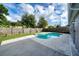 Backyard pool area with a fenced yard at 5418 S Bracken Ct, Winter Park, FL 32792