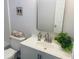 Clean bathroom with white vanity and modern fixtures at 620 Oak St, Auburndale, FL 33823