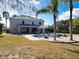 Expansive backyard featuring a pool, patio, and ample green space, ideal for outdoor living and entertaining at 10542 Wittenberg Way, Orlando, FL 32832