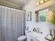 Clean bathroom featuring a shower and tub combination with a modern vanity and decor at 10542 Wittenberg Way, Orlando, FL 32832