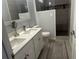 Modern bathroom featuring a double sink vanity and a stylish walk-in shower at 10542 Wittenberg Way, Orlando, FL 32832