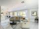 Bright and airy living space with large windows, modern furnishings, a stylish rug, and open layout to dining area at 10542 Wittenberg Way, Orlando, FL 32832