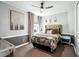 Comfortable bedroom with neutral tones, stylish furnishings, and a cozy ambiance at 14132 Murcott Blossom Blvd, Winter Garden, FL 34787