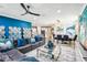 Open-concept living space flowing into a dining area and kitchen, perfect for modern living at 14132 Murcott Blossom Blvd, Winter Garden, FL 34787
