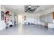 Spacious garage providing parking, storage, and laundry at 4245 Arlington Ridge Blvd, Leesburg, FL 34748