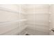 Spacious walk-in pantry with ample shelving provides great storage at 4245 Arlington Ridge Blvd, Leesburg, FL 34748