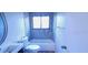 Cozy bathroom featuring a tub and shower combo with blue accent wall at 261 Dublin Dr, Lake Mary, FL 32746